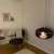 Ceiing-mounted bioethanol fireplace Cocoon Aeris Black with steel mounting rod